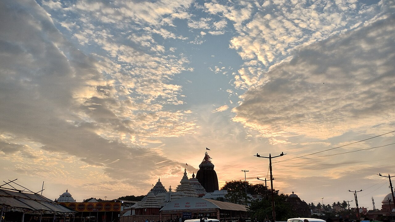 The Jagannath Temple, Puri, seen over the rooftops of the temple town in the evening
