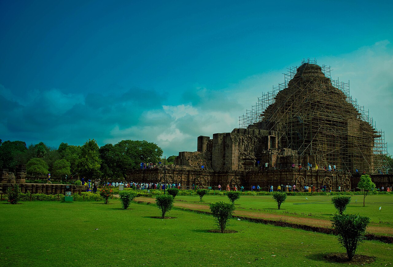 The carved stone facade and chariot wheels of Konark Sun Temple