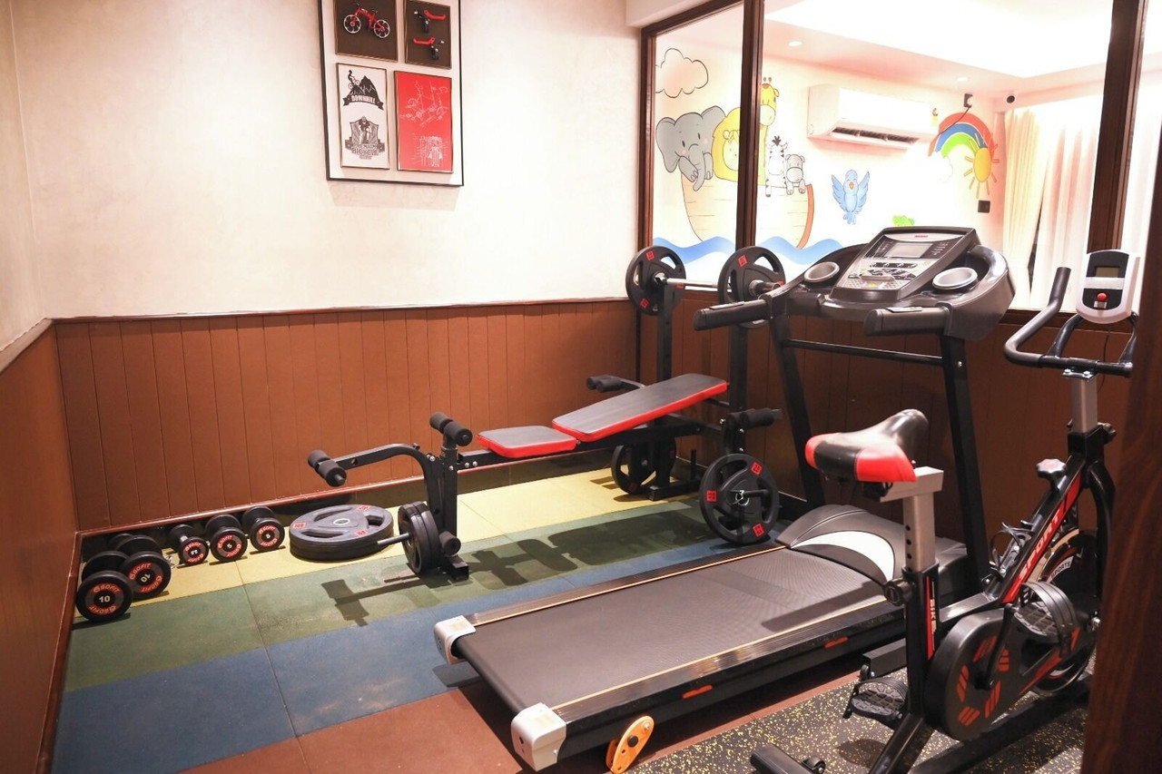The gym at Hotel Sonar Bangla, Puri, with resistance machines and floor space