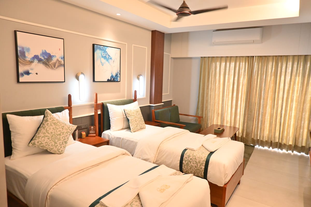 Platinum Twin Bed — twin beds with a long window and sitting area